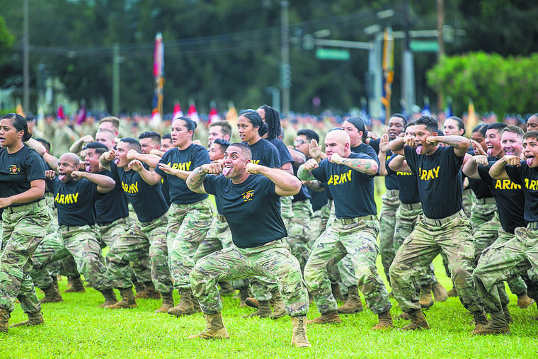 DENNIS ODA / DODA@STARADVERTISER.COM
                                Hui Ha‘a Koa from the 25th Infantry Division performed a haa during Tuesday’s Change of Command and Assumption of Responsibility Ceremony at Schofi eld Barracks.