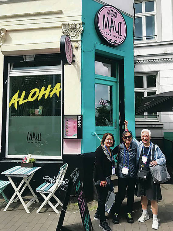 On a recent trip to Hamburg, Germany, Candice Naito, 
Tina Tom and Mary Ann Berry stopped in front of Maui Poke Guys near the Messe convention center.