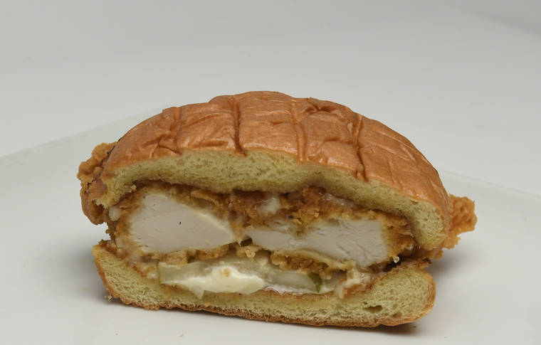   BRUCE ASATO / BASATO@STARADVERTISER.COM
Popeye's new chicken sandwich generated so much buzz on the mainland that the chain ran out of chicken for months. 