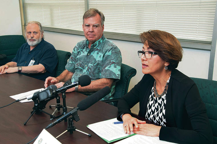 CRAIG T. KOJIMA / CKOJIMA@STARADVERTISER.COM
                                Dr. Al Bronstein, left, state Health Director Bruce Anderson and Lola Irvin, state health administrator for the Chronic Disease Prevention and Health Promotion Division, met Friday at the Health Department to discuss two more cases of vaping-related illnesses.