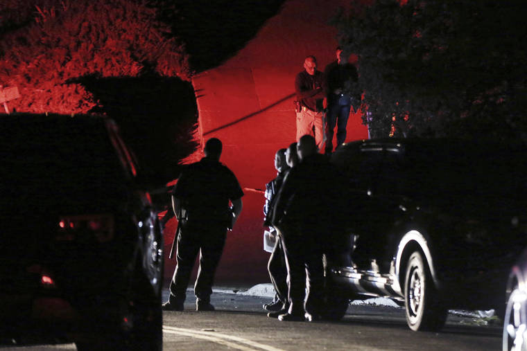 RAY CHAVEZ/EAST BAY TIMES VIA AP / OCT. 31
                                Contra Costa County Sheriff deputies investigate a multiple shooting in Orinda, Calif. Four people were killed and four others wounded in a Halloween night party shooting at a large rental home in a wealthy San Francisco Bay Area community, police said Friday. The shooting in the city of about 20,000 just east of Berkeley, happened at a party attended by 100 people said police chief David Cook.