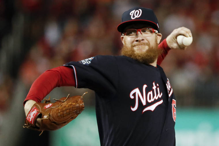ASSOCIATED PRESS
                                Washington Nationals relief pitcher Sean Doolittle throws during the seventh inning of Game 5 of the baseball World Series against the Houston Astros in Washington.