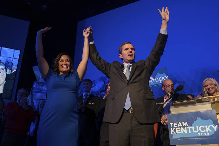 ASSOCIATED PRESS
                                Democratic gubernatorial candidate and Kentucky Attorney General Andy Beshear, along with lieutenant governor candidate Jacqueline Coleman, acknowledged supporters at the Kentucky Democratic Party election night watch event, Tuesday, in Louisville, Ky.