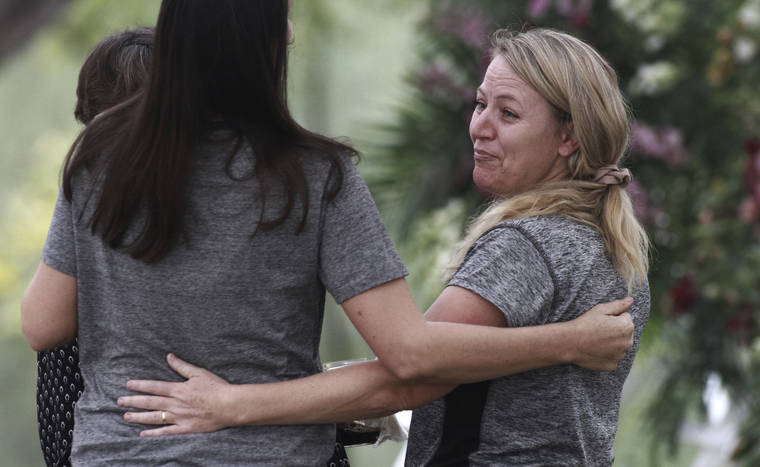 ASSOCIATED PRESS
                                Women embraced, today, during the funeral of Dawna Ray Langford, 43, and her sons Trevor, 11, and Rogan, 2, who were killed by drug cartel gunmen, at the cemetery in La Mora, Sonora state, Mexico. Three women and six of their children, related to the extended LeBaron family, were gunned down in an attack while traveling along Mexico’s Chihuahua and Sonora state border on Monday.
