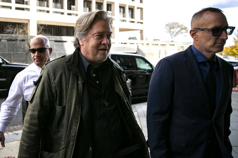 ASSOCIATED PRESS
                                Former White House strategist Steve Bannon arrived to testify for the federal trial of Roger Stone, at federal court in Washington, today.