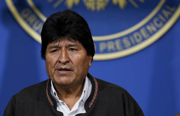 ASSOCIATED PRESS
                                Bolivia’s President Evo Morales looks on during a press conference in La Paz, Bolivia, t oday. Morales is calling for new presidential elections and an overhaul of the electoral system after a preliminary report by the Organization of American States found irregularities in the Oct. 20 elections.