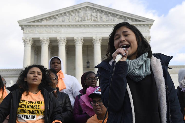 ASSOCIATED PRESS
                                Michelle Lainez, 17, originally from El Salvador but now living in Gaithersburg, Md., speaks during a rally outside the Supreme Court in Washington on Friday.