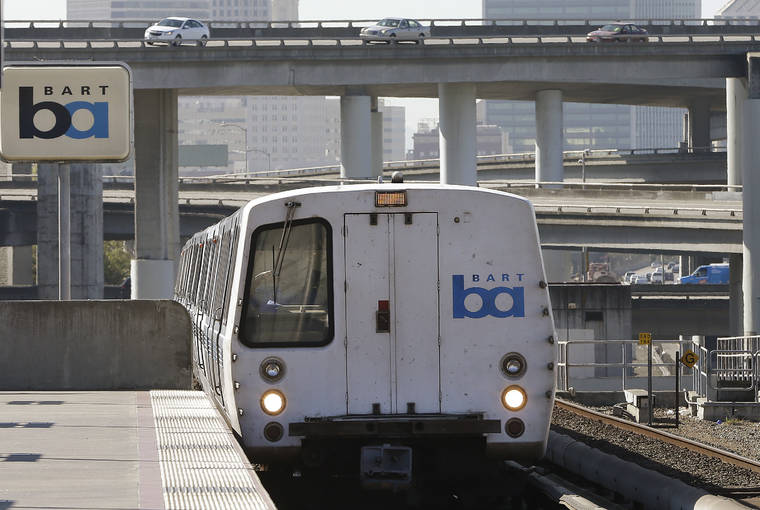 ASSOCIATED PRESS
                                In this Oct. 15, 2013, file photo, a Bay Area Rapid Transit train departs the MacArthur station in Oakland, Calif. The head of the San Francisco Bay Area commuter train system is apologizing to a black rider who was detained and cited by police for eating a breakfast sandwich on a train platform, BART general manager Bob Powers said in a statement Monday, Nov. 11, 2019. (AP Photo/Ben Margot, File)
