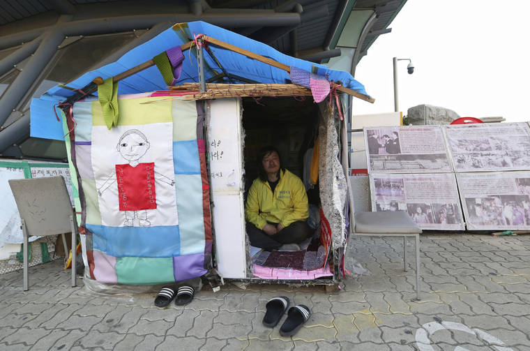 ASSOCIATED PRESS
                                Choi Seung-woo, a victim of Brothers Home, sat in a tent near the National Assembly in Seoul, South Korea on April 2. Choi and a small number of other Brothers Home inmates have been camping out in front of the National Assembly’s gate for more than two years calling for lawmakers to pass a bill that would launch a full investigation into past human rights atrocities, including the Brothers Home incident.
