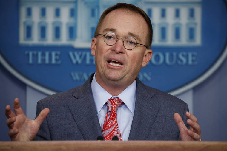 ASSOCIATED PRESS
                                Acting White House chief of staff Mick Mulvaney spoke, Oct. 17, in the White House briefing room in Washington.