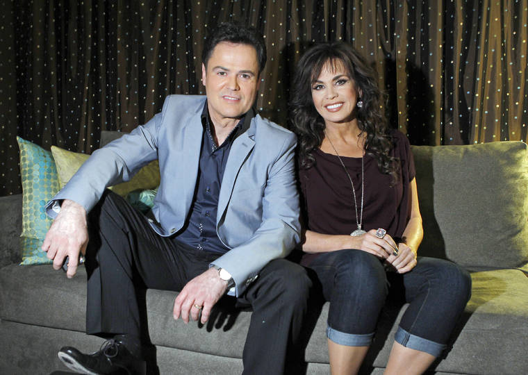 ASSOCIATED PRESS
                                Donny Osmond, left, and Marie Osmond pose backstage at their show at the Flamingo hotel and casino in Las Vegas in 2011. Marie Osmond says she’s ready for the final week of an 11-year run with her brother, Donny, at the Flamingo Las Vegas, after telling the audience on her television talk show that she chipped her knee late last week.