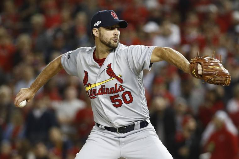 ASSOCIATED PRESS
                                St. Louis Cardinals relief pitcher Adam Wainwright throws during the second inning of Game 4 of the baseball National League Championship Series in Washington on Oct. 15. The St. Louis Cardinals and Adam Wainwright have agreed to a contract for next season, raising the likelihood that the veteran pitcher finishes his career with the only major league team he has ever played for.