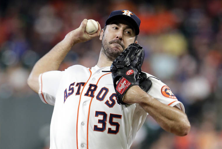 ASSOCIATED PRESS
                                Houston Astros starting pitcher Justin Verlander threw to an Oakland Athletics batter, July 24, during a baseball game in Houston. Verlander has been awarded his second AL Cy Young Award.