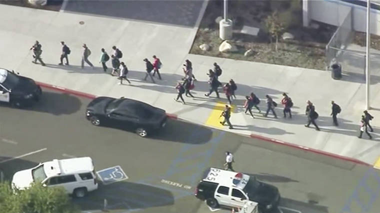 KTTV-TV via ASSOCIATED PRESS
                                People were led out of Saugus High School after reports of a shooting, today, in Santa Clarita, Calif. The Los Angeles County Sheriff’s Department said on Twitter that deputies are responding to the high school about 30 miles northwest of downtown Los Angeles.