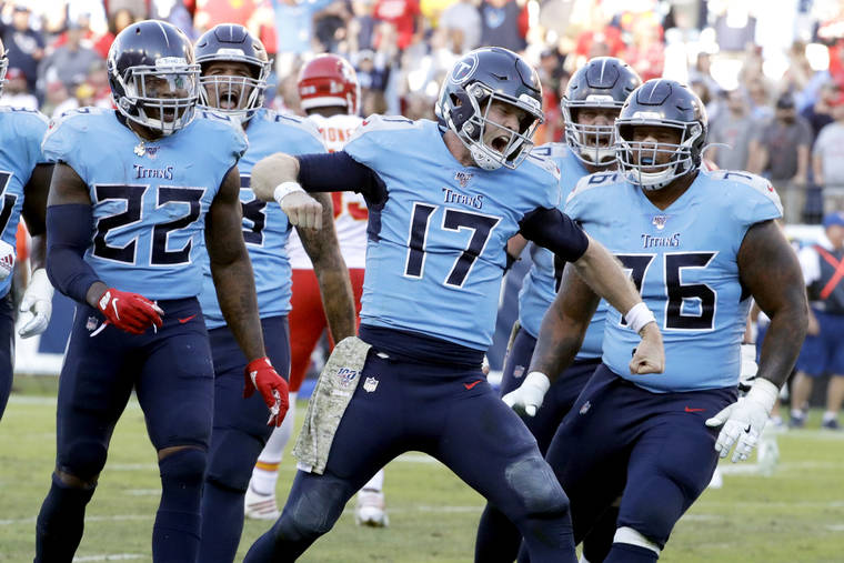 ASSOCIATED PRESS
                                Tennessee Titans quarterback Ryan Tannehill (17) celebrates after scoring a 2-point conversion against the Kansas City Chiefs in the second half of an NFL football game on Nov. 10 in Nashville, Tenn. The Titans won 35-32.