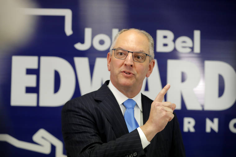 ASSOCIATED PRESS
                                Louisiana Gov. John Bel Edwards talks to media at his campaign office in Shreveport, La. Edwards, a Democrat, was campaigning in the same metropolitan area his Republican challenger, Eddie Rispone, will be holding a campaign rally with President Donald Trump later in the evening.