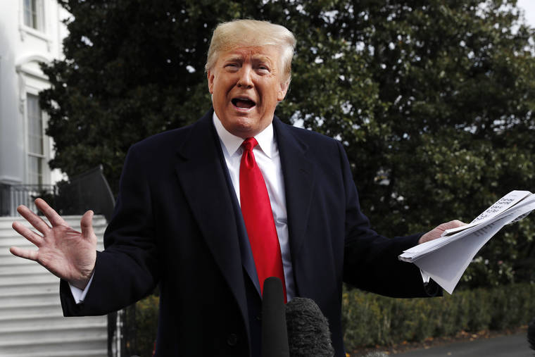 ASSOCIATED PRESS
                                President Donald Trump held handwritten notes as he spoke to the media, today, about the House Intelligence Committee testimony of U.S. Ambassador to the European Union Gordon Sondland, as Trump left the White House in Washington, en route to Texas.