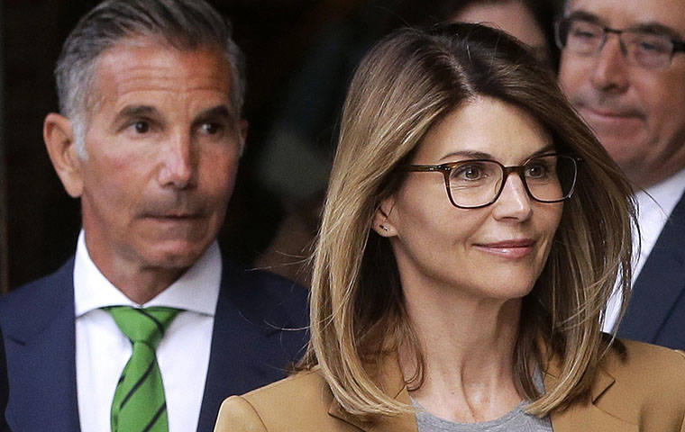 ASSOCIATED PRESS
                                Actress Lori Loughlin, front, and husband, clothing designer Mossimo Giannulli, left, left federal court in Boston, April 3, after facing charges in a nationwide college admissions bribery scandal. Lawyers for Loughlin and Giannulli filed court documents today, saying the couple plans to plead not guilty to charges of conspiracy to commit federal program bribery.