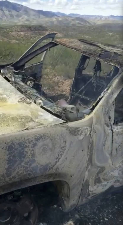 KENNY MILLER/COURTESY OF ALEX LEBARON VIA ASSOCIATED PRESS
                                A video framegrab, taken Monday, by Kenny Miller and posted on the Twitter account of Alex LeBaron shows a burned-out vehicle that was being used by some members of the LeBaron family as they were driving in a convoy near the Sonora-Chihuahua border in Mexico. Mexican authorities say drug cartel gunmen ambushed multiple vehicles, including this one, slaughtering several women and children.