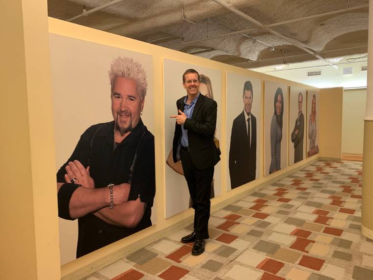COURTESY KA’UHANE INC.
                                Kaanapali Beach Hotel Director of Sales and Marketing John White poses with a poster of Food Network personality Guy Fieri. White was part of a team from the Kaanapali Beach Resort Association in New York to meet with media contacts.