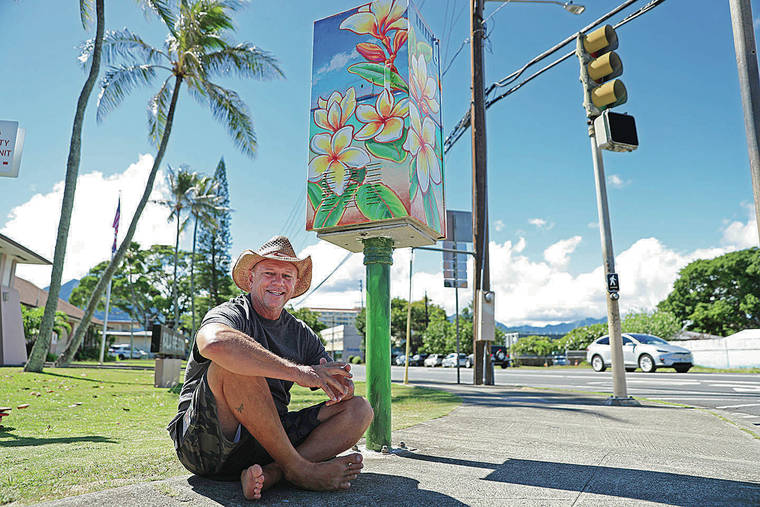 JAMM AQUINO / JAQUINO@STARADVERTISER.COM
                                Kauai-based artist Patrick Ching shows off a utility box he painted at the corner of Kuulei Road and South Kainalu Drive in Kailua. “I’m really happy with how it came out,” said Ching, an artist who often favors native wildlife as a subject. “I wanted to make it look nice and cheerful, and make people smile as they’re coming down this stretch, with the colors of Kailua Bay.”