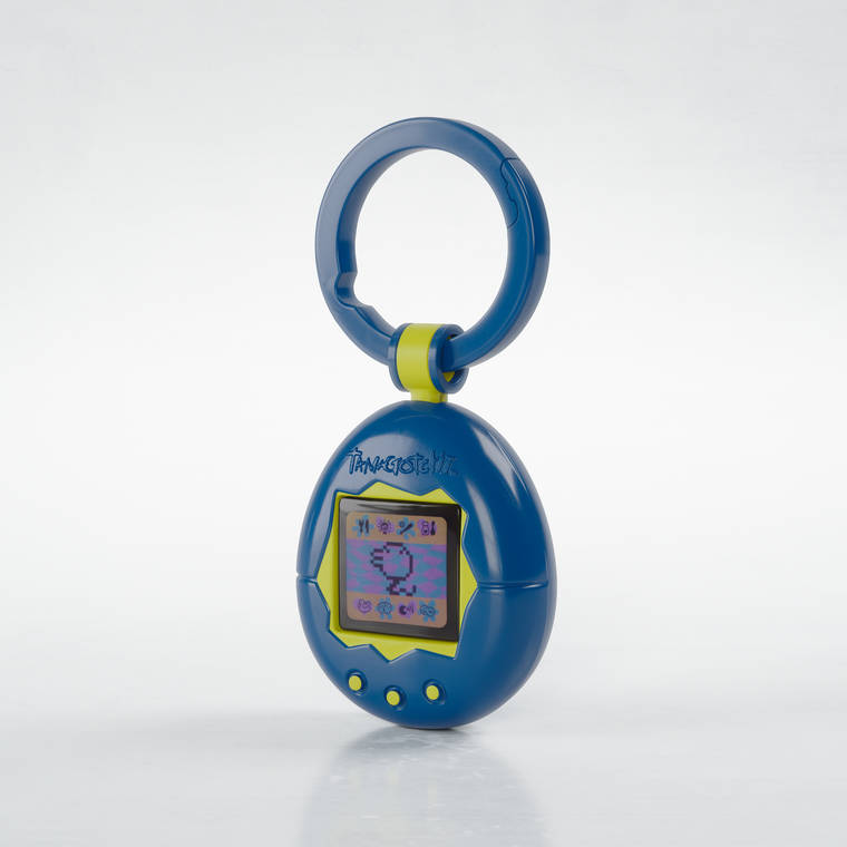 COURTESY MCDONALD’S
                                The egg-shaped Tamagotchi toy was popular in 1998 as a handheld digital pet.