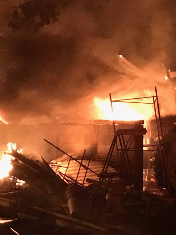 COURTESY MAUI FIRE DEPARTMENT
                                At about 8:40 p.m. Sunday, fire crews arrived on scene and found a warehouse fully involved in fire at the park at 757-797 Pulehu Road.
