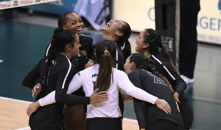 BRUCE ASATO / BASATO@STARADVERTISER.COM
                                Hawaii players celebrate a point against Cal Poly on Nov. 3.