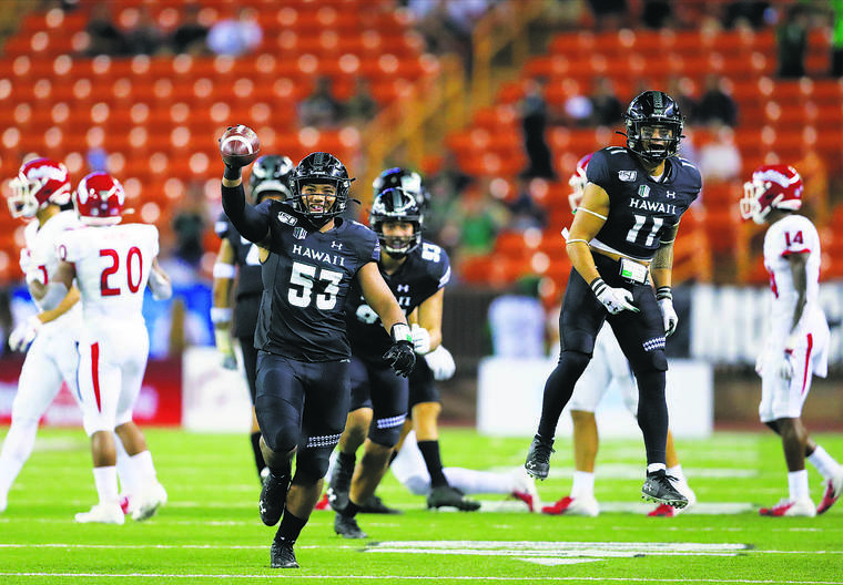 JAMM AQUINO / JAQUINO@STARADVERTISER.COM
                                Hawaii linebacker Darius Muasau recovered an onside kick against Fresno State last Saturday at Aloha Stadium. The Rainbow Warriors converted the possession into a tying touchdown before Fresno State kicked a last-second field goal for a 41-38 win.