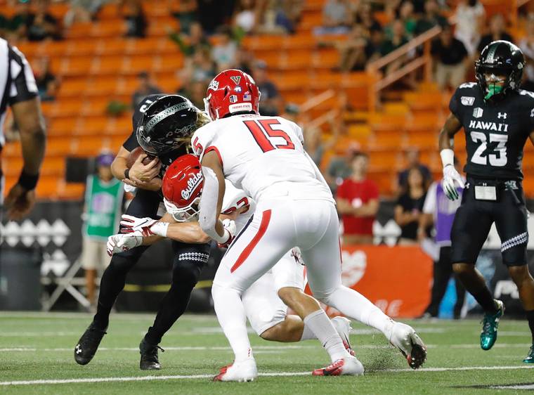 JAMM AQUINO / JAQUINO@STARADVERTISER.COM
                                Hawaii quarterback Cole McDonald runs in for a touchdown in the second quarter.