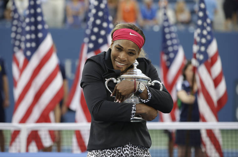 ASSOCIATED PRESS / 2014
                                Serena Williams, of the United States, hugs the championship trophy after defeating Caroline Wozniacki, of Denmark, during the championship match of the U.S. Open on Sept. 7, 2014.