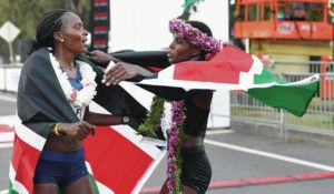 BRUCE ASATO / BASATO@STARADVERTISER.COM
                                Margaret Wanguri Muriuki of Kenya, right, finished ahead of Betsy Saina of Kenya, left, in the Honolulu Marathon on Sunday.