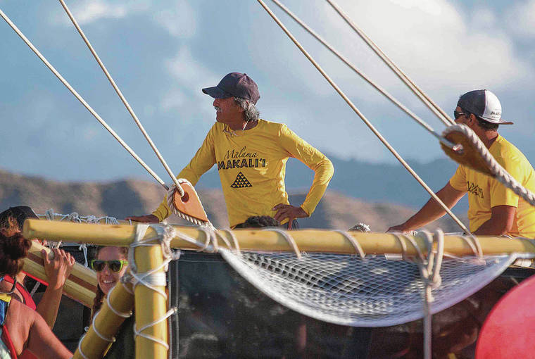 COURTESY JASON PATTERSON / © ‘OIWI TV
                                Master navigator Shorty Bertelmann supervises the crew as Makali‘i sails past Molokai on her voyage to Mokumanamana (Necker Island).