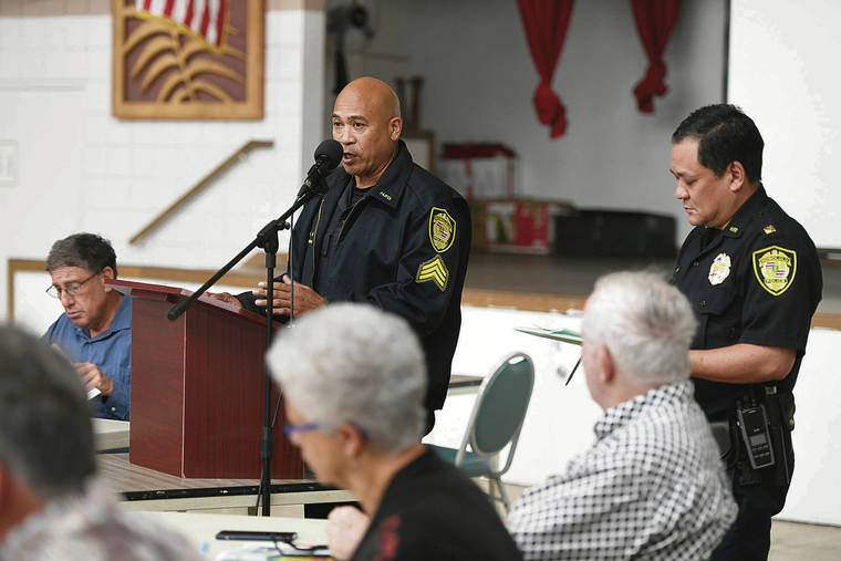 BRUCE ASATO / BASATO@STARADVERTISER.COM
                                Honolulu Police Department Sgt. Glenn Romero, left, and Lt. Tate Nojima presented December 2019 crime statistics for District 6 and tips during a Waikiki Neighborhood Board meeting on Tuesday. Waikiki stakeholders are planning to host a crime summit in March.