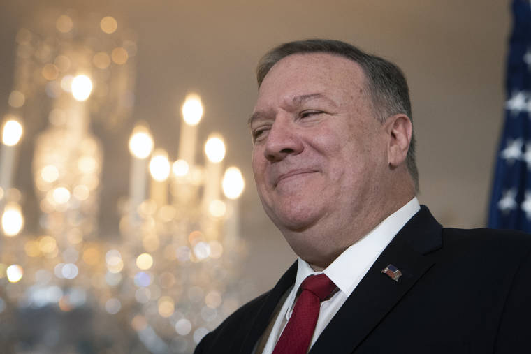 ASSOCIATED PRESS
                                Secretary of State Mike Pompeo pauses as he meets with Benin President Patrice Talon at the State Department in Washington today.
