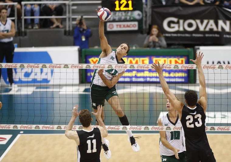 CINDY ELLEN RUSSELL / CRUSSELL@STARADVERTISER.COM 
                                Hawaii’s Guilherme Voss makes a kill against the Grand Canyon Antelopes during the first set.