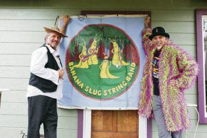 COURTESY DOUG GREENFIELD
                                Long-time bandmates “Doug Dirt” and “Airy Larry” of the Banana Slug String Band are playing their way through some of Oahu’s public libraries.