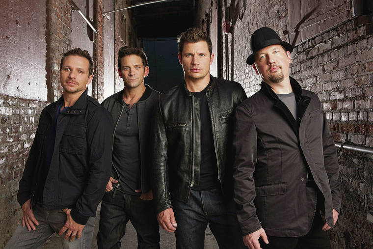 COURTESY 98°
                                Drew Lachey, left, Jeff Timmons, Nick Lachey and Justin Jeffre became worldwide stars in the late ’90s as the band 98°.