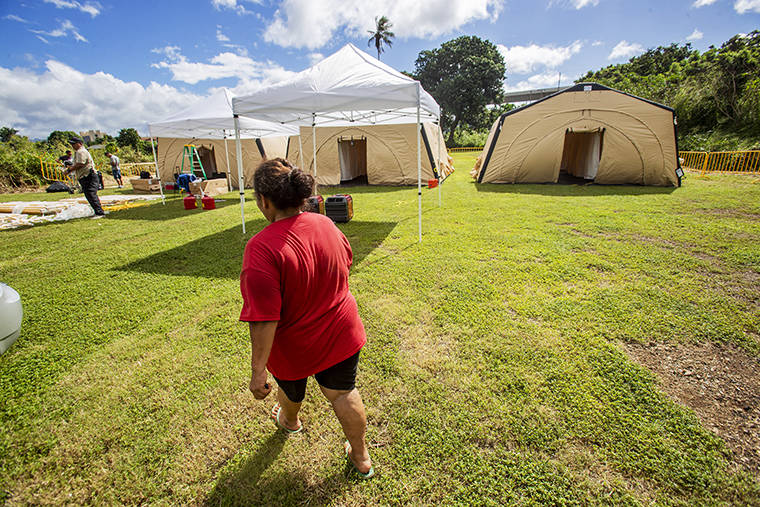 DENNIS ODA / DODA@STARADVERTISER.COM
                                Tents are seen at the HONU homeless triage program at Waipahu Cultural Garden Park in December. The program will relocate next week to Old Stadium Park in Moiliili.