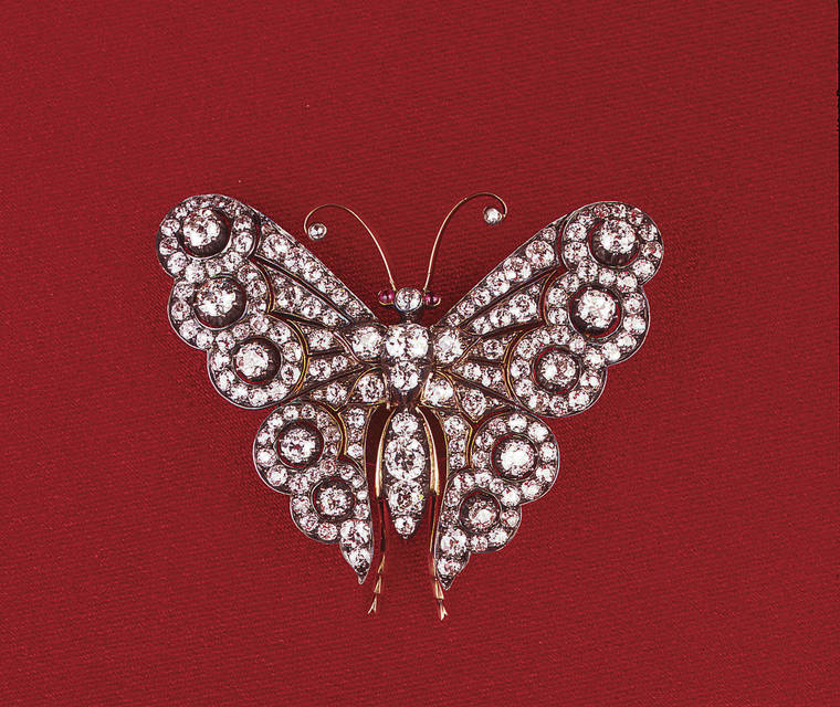 COURTESY FRIENDS OF IOLANI PALACE
                                Then-Princess Lili‘uokalani purchased a glittering diamond-studded butterfly brooch when she was in London to attend Queen Victoria’s Golden Jubilee in June 1887. It became one of her signature jewelry pieces as she is seen wearing it in formal portraits as both princess and queen.
