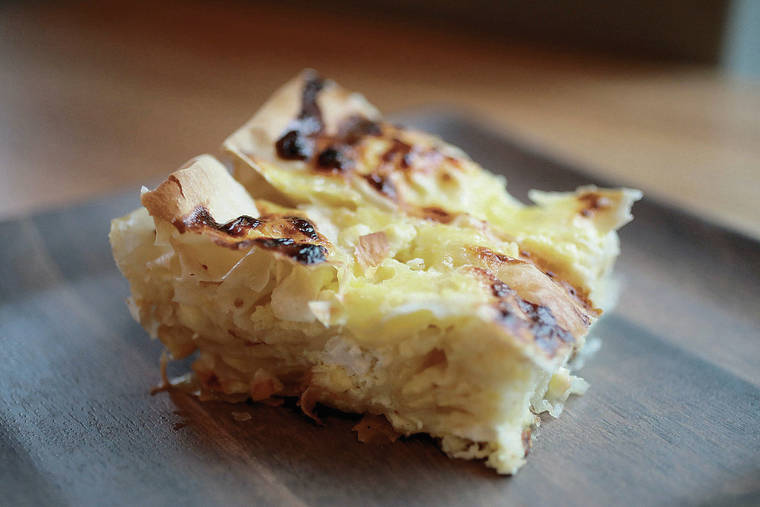 TRIBUNE NEWS SERVICE
                                A slice of Balkan cheese pie made by Monica Obradovic.