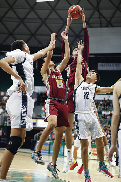CINDY ELLEN RUSSELL / CRUSSELL@STARADVERTISER.COM
                                Maryknoll’s Sage Tolentino reached for the rebound over Kamehameha’s Joshua Parker and teammate Parker Grant.