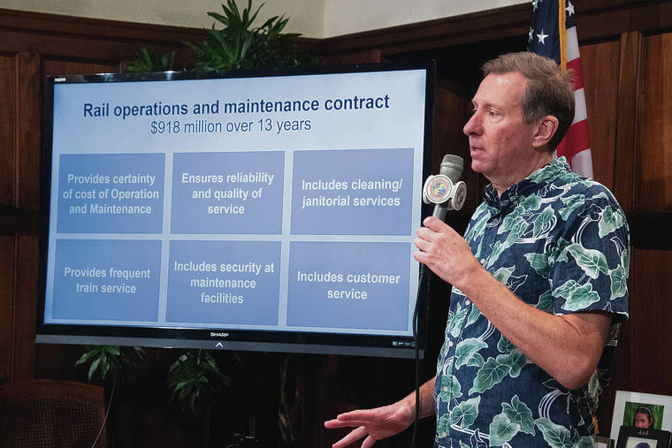 CRAIG T. KOJIMA /CKOJIMA@STARADVERTISER.COM
                                Mark Garrity, operations and maintenance rail interface manager with the Department of Transportation Services, provided an update Wednesday on a contract for the first 13-1/4 years of operations and maintenance for the Honolulu rail system.