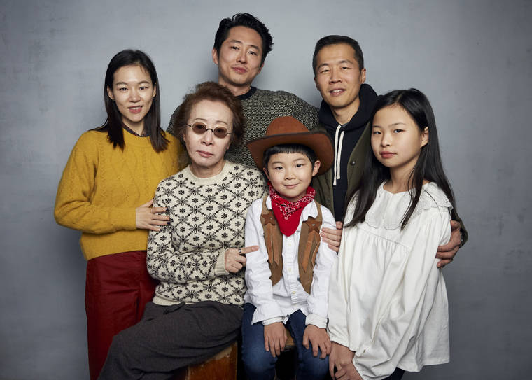 ASSOCIATED PRESS
                                Han Yeri, from top left, Steven Yeun, director Lee Isaac Chung, Yuh Jung Youn, from bottom left, Alan Kim, and Noel Cho pose for a portrait to promote the film “Minari” at the Music Lodge during the Sundance Film Festival on Monday in Park City, Utah.
