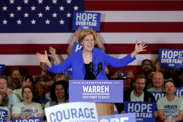 ASSOCIATED PRESS
                                Democratic presidential candidate Sen. Elizabeth Warren, D-Mass., speaks to supporters at a caucus night campaign rally today in Des Moines, Iowa.