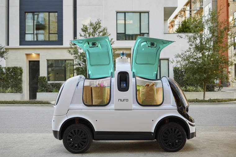 NURO VIA ASSOCIATED PRESS
                                Nuro’s self-driving vehicle “R2” carried bags of groceries in an undated photo. The U.S. National Highway Traffic Safety Administration , today, granted temporary approval for Silicon Valley robotics company Nuro to the a low-speed autonomous delivery vehicle, without side and rear-view mirrors and other safety provisions required of vehicles driven by humans.