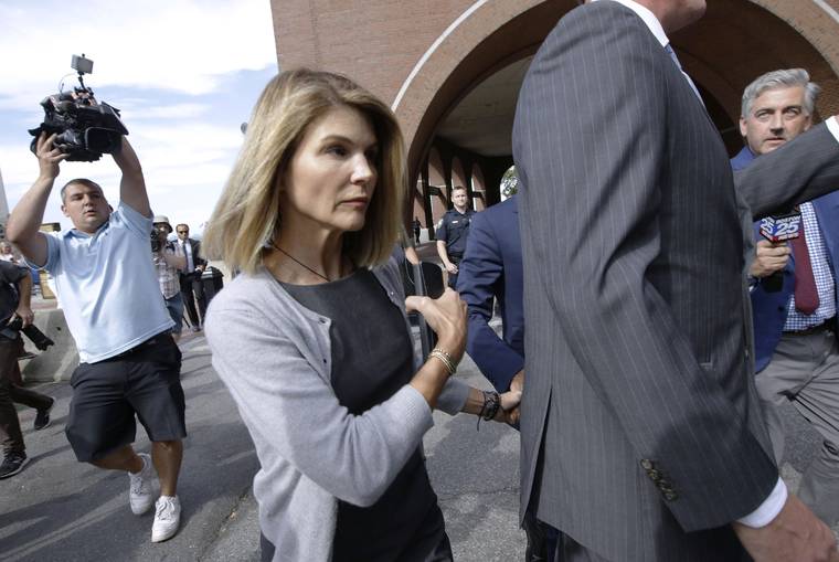 ASSOCIATED PRESS / 2019
                                Actress Lori Loughlin departs federal court in Boston, after a hearing in a nationwide college admissions bribery scandal.