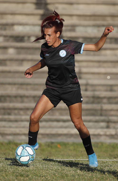 ASSOCIATED PRESS / FEB. 12
                                Soccer player Mara Gomez trains with her first division women’s soccer team, Villa San Carlos, in La Plata, Argentina. Gomez is a transgender woman who is limited to only training with her team while she waits for permission to start playing from the Argentina Football Association (AFA). If approved, she would become the first trans woman to compete in a first division, professional Argentine AFA tournament.