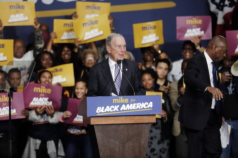 ELIZABETH CONLEY/HOUSTON CHRONICLE VIA AP
                                Democratic presidential candidate and former New York City Mayor Michael Bloomberg speaks during a campaign rally at the Buffalo Soldier Museum in Houston. Houston Mayor Sylvester Turner stands at right.