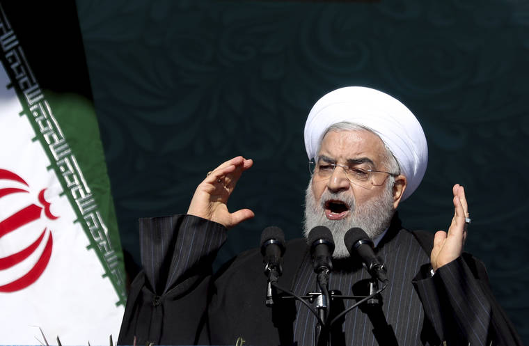ASSOCIATED PRESS
                                Iranian President Hassan Rouhani speaks during a ceremony celebrating the 41st anniversary of the Islamic Revolution, at the Azadi, Freedom, Square in Tehran, Iran, on Feb. 11.